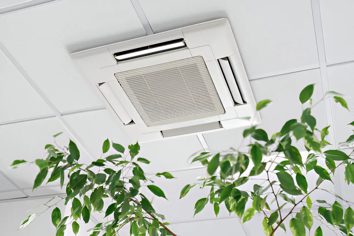 Team of air conditioning contractor Los Angeles technicians working on central HVAC installation