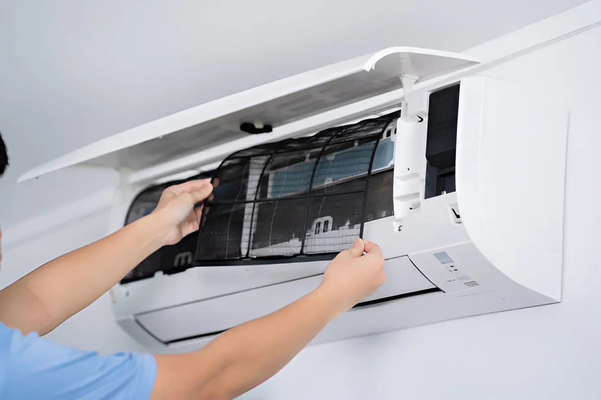 Technician providing expert air conditioning service in a Los Angeles home